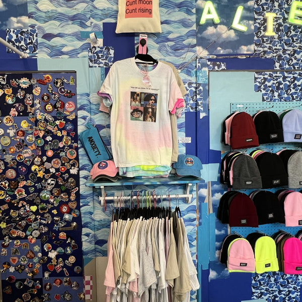 Word beanies in every color under the ALIENS letters at Aliens of Brooklyn, 1630 E 6th St, East Austin