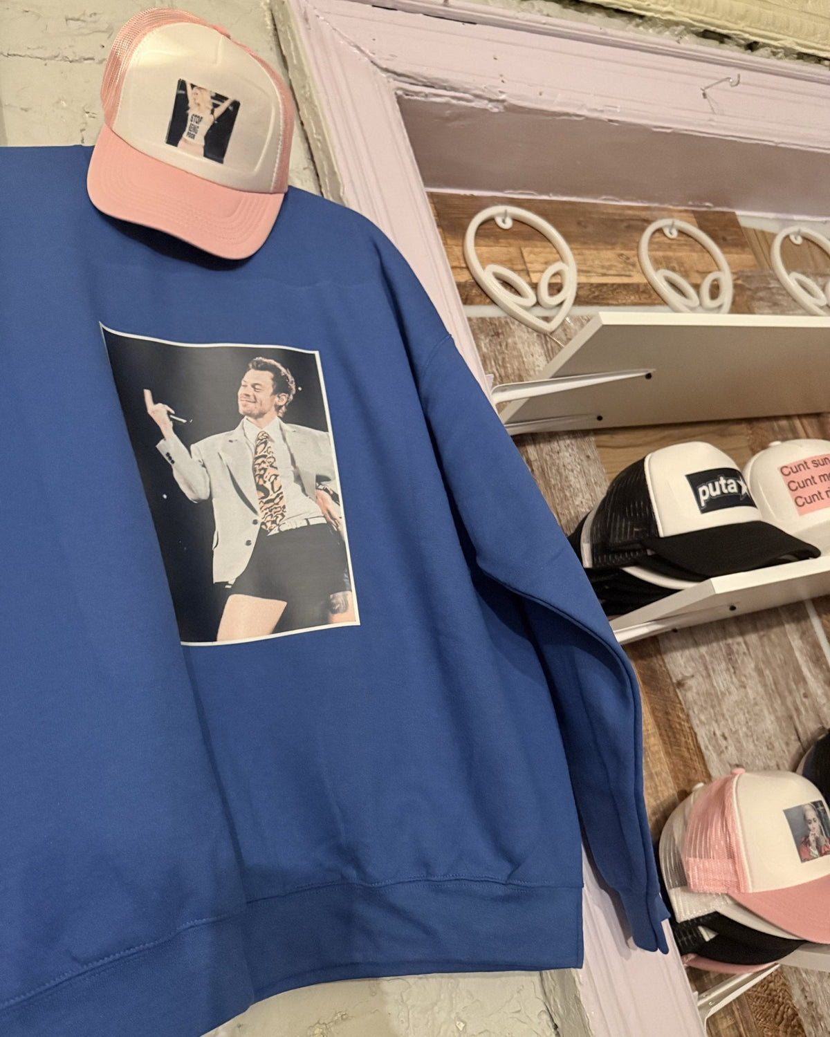Blue Harry photo sweatshirt and trucker caps at Aliens of Brooklyn, East Village