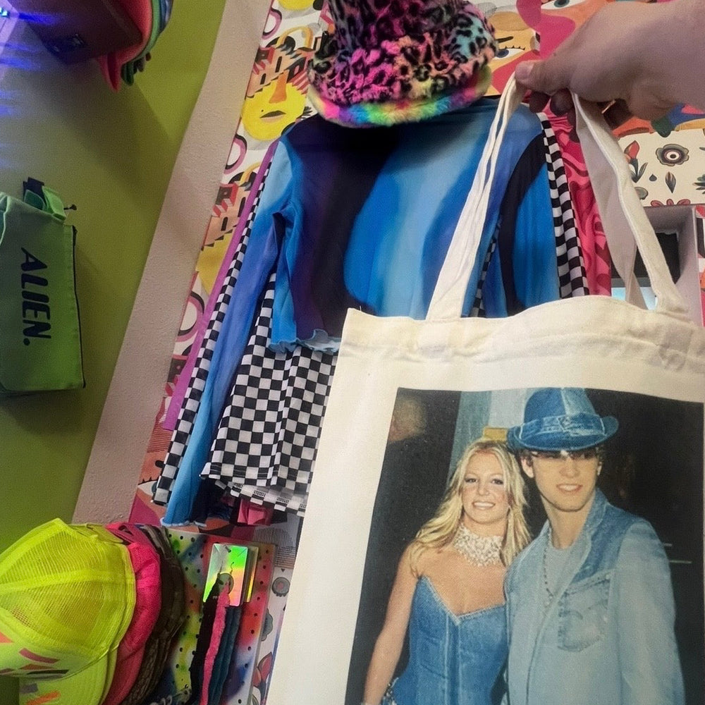 Printed tote bags and shirts at Aliens of Brooklyn