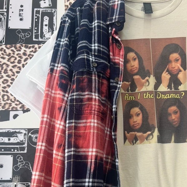 Printed tees and flannel on the rack